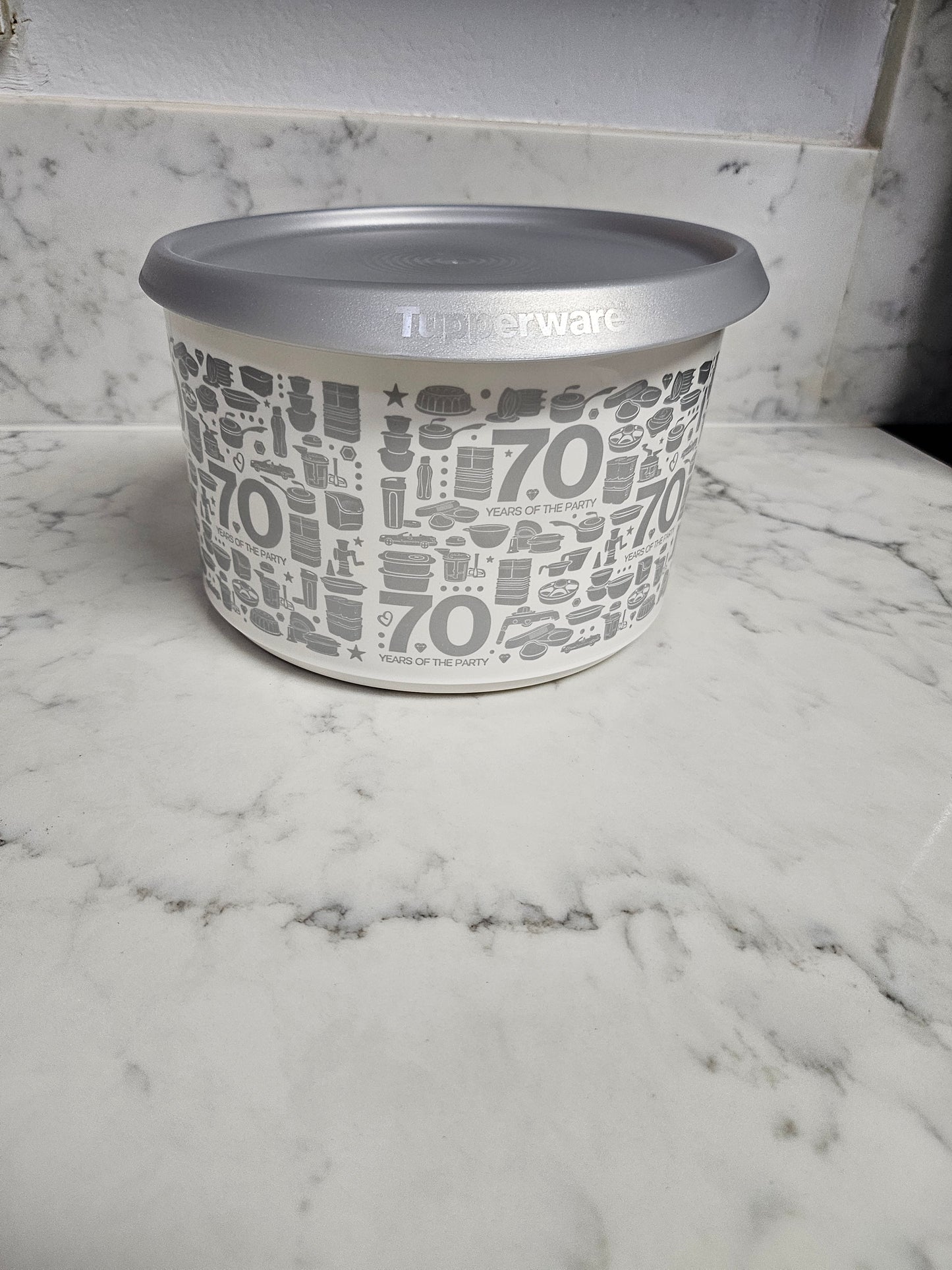 Tupperware 4 piece 70 years canister set