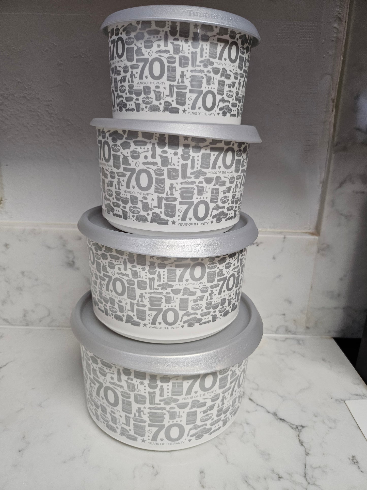 Tupperware 4 piece 70 years canister set